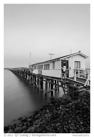 Pier on San Pablo Bay at sunset. San Pablo Bay, California, USA (black and white)