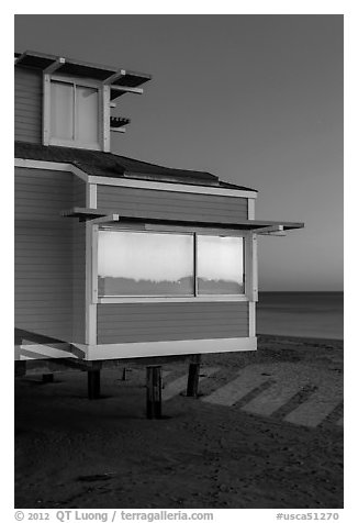 Contemporary beach house at dusk, sunset reflection, Stinson Beach. California, USA