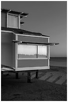 Contemporary beach house at dusk, sunset reflection, Stinson Beach. California, USA (black and white)