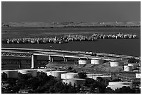 Oil tanks, Carquinez Strait, and mothball fleet. Martinez, California, USA (black and white)