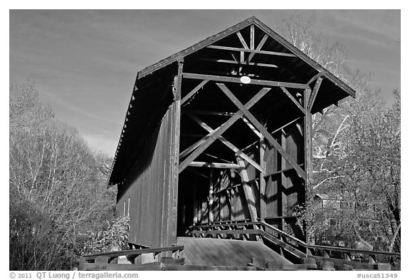 Brown truss covered bridge over the San Lorenzo River, Felton. California, USA (black and white)