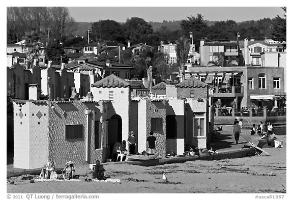 Beachfront with vividly painted cottages. Capitola, California, USA (black and white)
