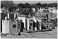 Beachfront with vividly painted cottages. Capitola, California, USA (black and white)