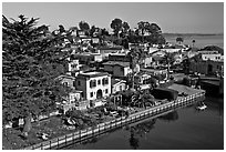 Houses bordering Soquel Creek from above. Capitola, California, USA ( black and white)