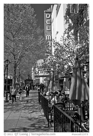 Outdoor tables and theater on Pacific Avenue. Santa Cruz, California, USA (black and white)