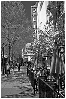 Outdoor tables and theater on Pacific Avenue. Santa Cruz, California, USA ( black and white)