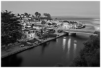 Bridges over Soquel Creek and village at dusk. Capitola, California, USA (black and white)