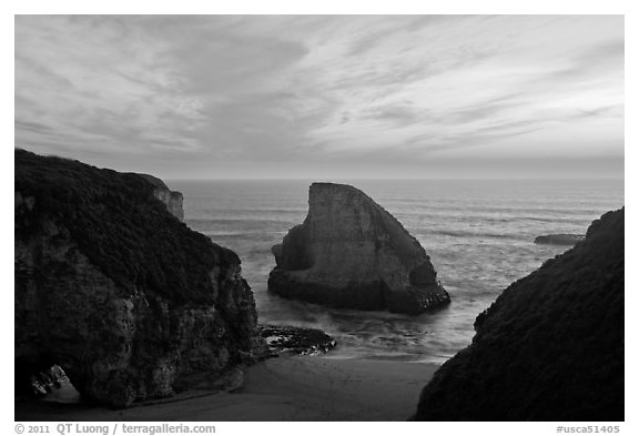 Offshore rock at sunset, Davenport. California, USA (black and white)