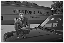 Student showing car keys. Stanford University, California, USA (black and white)