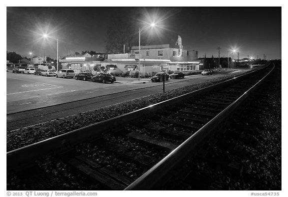 Railroad tracks and restaurant at night, Alviso. San Jose, California, USA