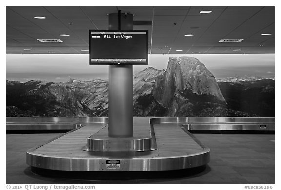 Baggage claim area and Half-Dome mural, Fresno Yosemite Airport. California, USA (black and white)