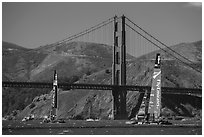 USA and New Zealand America's cup boats and Golden Gate Bridge. San Francisco, California, USA ( black and white)