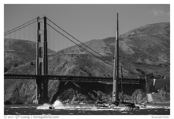 Oracle Team USA AC72 America's cup boat and Golden Gate Bridge. San Francisco, California, USA (black and white)