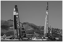USA and New Zealand boats foiling at 40 knots during final race of America's cup. San Francisco, California, USA (black and white)