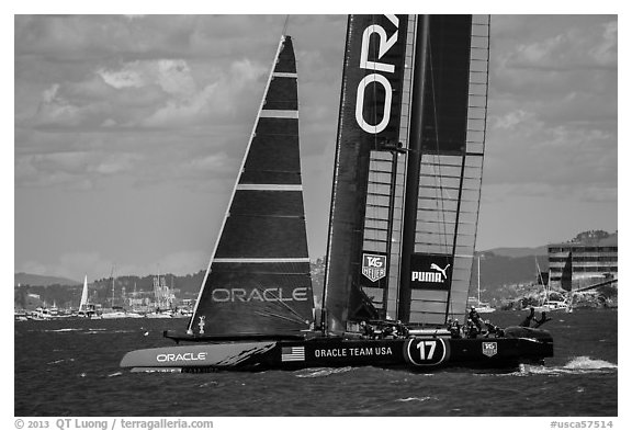Crew in action on USA boat during victorious final race. San Francisco, California, USA (black and white)