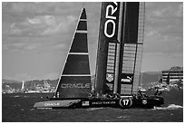 Crew in action on USA boat during victorious final race. San Francisco, California, USA (black and white)