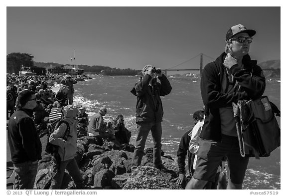 Spectators following America's Cup decisive race from shore. San Francisco, California, USA (black and white)