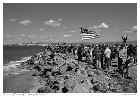 Spectators cheering during America's Cup decisive race. San Francisco, California, USA (black and white)