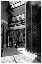 Woman walks in Rodeo Collection shopping area. Beverly Hills, Los Angeles, California, USA ( black and white)