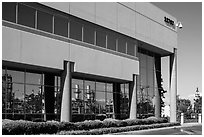 Oil refinery reflected in windows of office building, Manhattan Beach. Los Angeles, California, USA ( black and white)