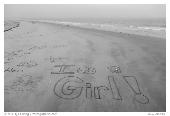 Words written in sand on beach. Newport Beach, Orange County, California, USA (black and white)