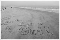Words written in sand on beach. Newport Beach, Orange County, California, USA ( black and white)