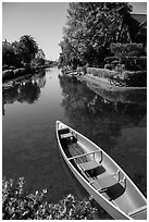 Red rowboat, Venice Canal Historic District. Venice, Los Angeles, California, USA ( black and white)