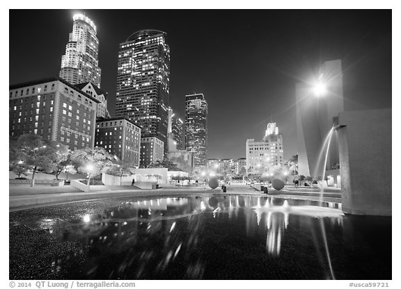 Fountain and skyscrappers at night, Pershing Square. Los Angeles, California, USA (black and white)