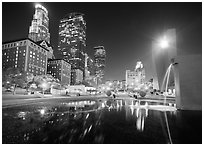 Fountain and skyscrappers at night, Pershing Square. Los Angeles, California, USA ( black and white)