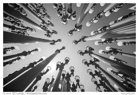 Looking up Chris Burden art installation of street lamps at LACMA. Los Angeles, California, USA (black and white)
