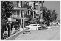 Women strolling on promenade. Long Beach, Los Angeles, California, USA ( black and white)