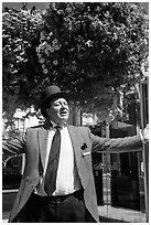 Man with red jacket, tie, and suit. Beverly Hills, Los Angeles, California, USA ( black and white)