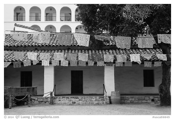 Colorful flags in courtyard. Santa Barbara, California, USA (black and white)