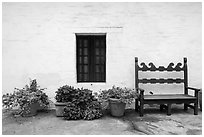 Potted plants, bench and wall, Historic Paseo. Santa Barbara, California, USA ( black and white)