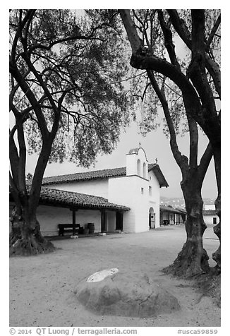 Chapel and Presidio seen through trees. Santa Barbara, California, USA (black and white)