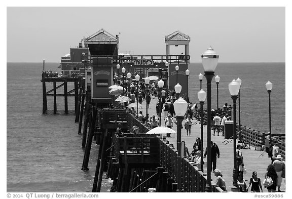 Lamps and pier, Oceanside. California, USA (black and white)