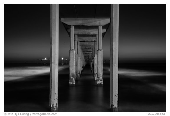 Underside of Ocean Beach Pier at night. San Diego, California, USA (black and white)