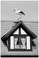 Stork on roof window. Solvang, California, USA ( black and white)