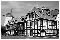 Half-timbered buildings and windmill. Solvang, California, USA ( black and white)