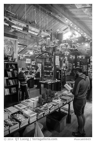Visitors browsing books, Henry Miller Memorial Library. Big Sur, California, USA (black and white)