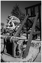 Mining equipment and statue commemorating gold rush, Auburn. Califoxrnia, USA ( black and white)