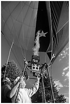 Pilot releases hot air into balloon, Tahoe National Forest. California, USA ( black and white)