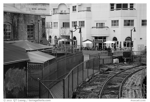 Historic, modern buildings, railroad tresle. Petaluma, California, USA (black and white)