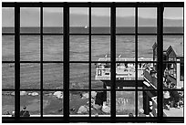 Monterey Bay framed by Monterey Bay Aquarium window. Monterey, California, USA ( black and white)
