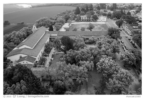 Aerial view of Mission San Juan courtyard and San Juan Bautista State Historic Park. San Juan Bautista, California, USA (black and white)