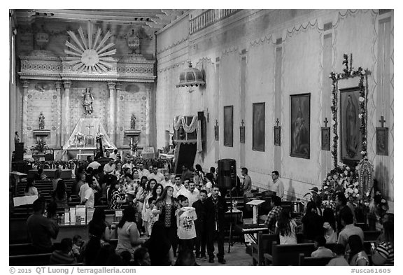 Church with festival in progress, Mission San Miguel. California, USA (black and white)