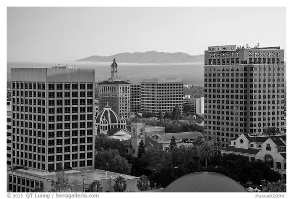 San Jose skyline at sunrise with fog over hills. San Jose, California, USA (black and white)