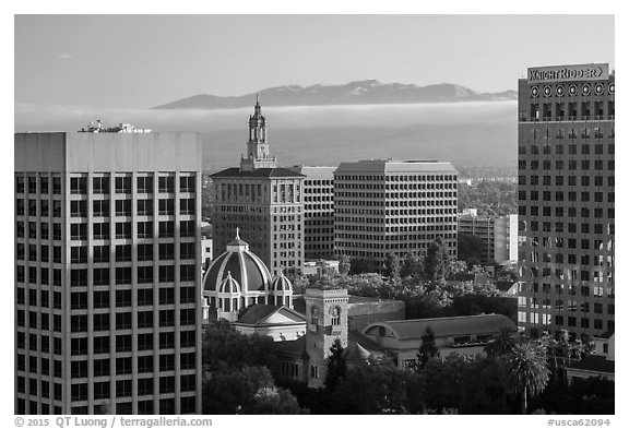 Downtown San Jose with early morning fog over hills. San Jose, California, USA (black and white)