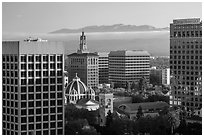 Downtown San Jose with early morning fog over hills. San Jose, California, USA ( black and white)