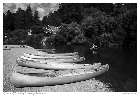Canoes and Russian River, Monte Rio. California, USA (black and white)